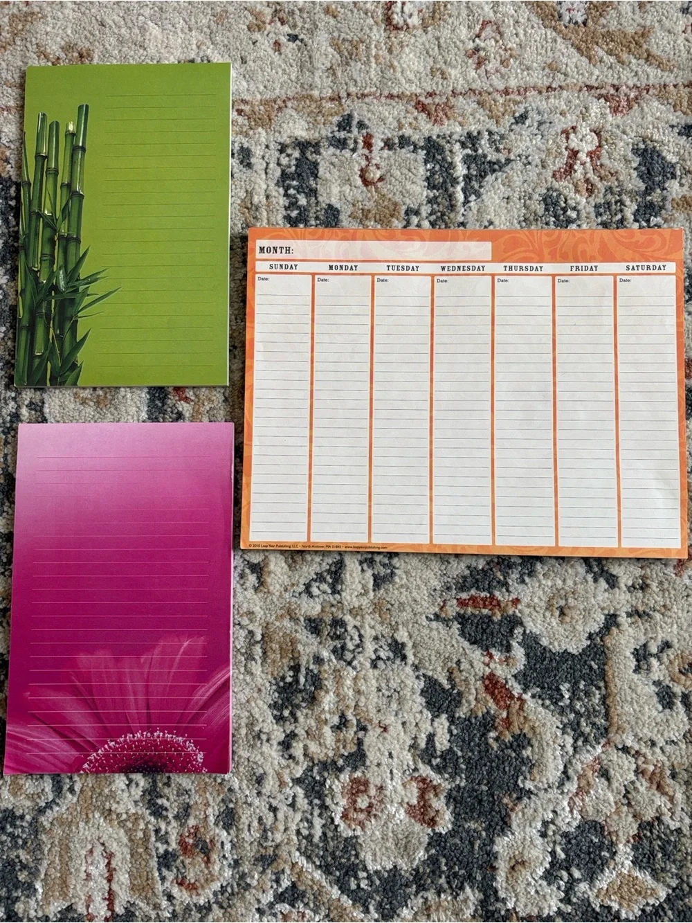 Weekly Orange Planner Pad with Green and Pink Notepads